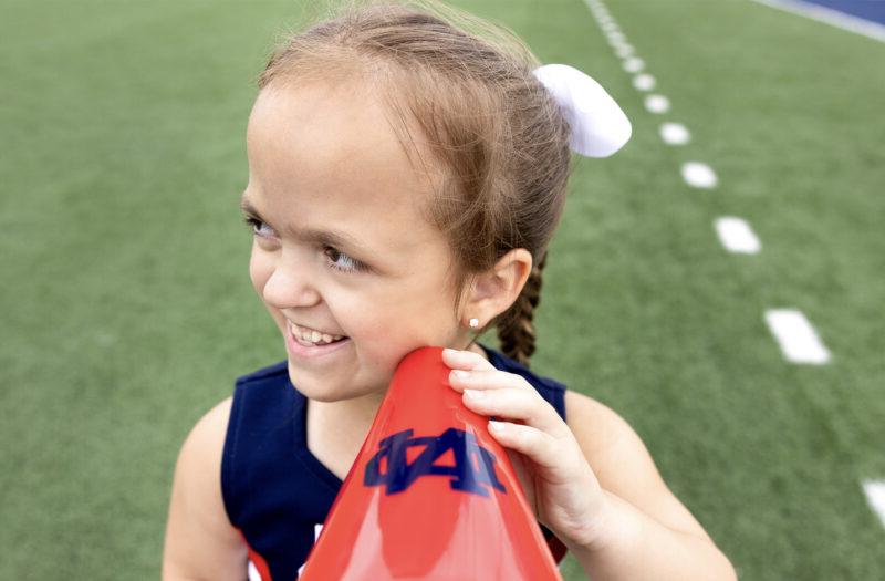 KK in her cheerleading outfit